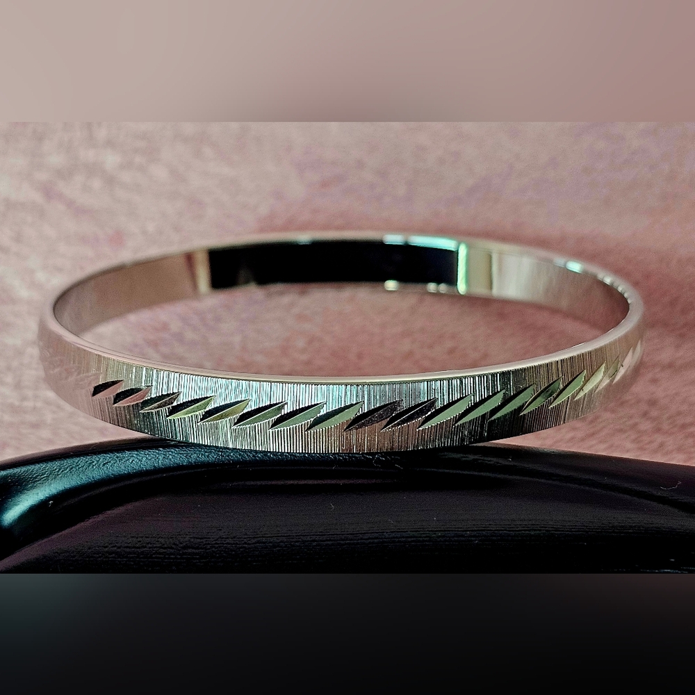Monet Silver Textured Bangle Bracelet